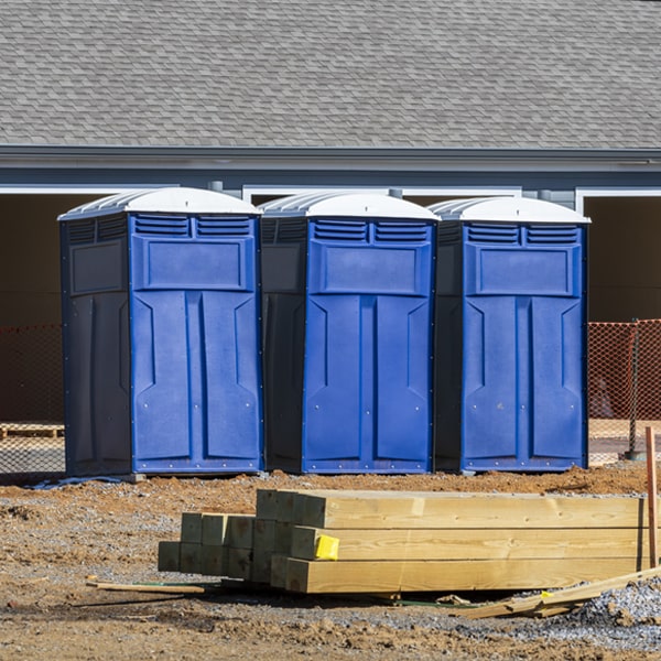 what is the cost difference between standard and deluxe portable toilet rentals in Alamo Georgia